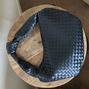 Woven black shoulder bag